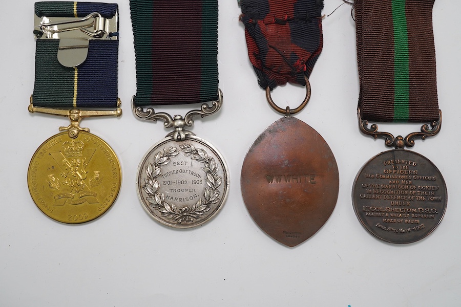 Four assorted medals; Royal East Kent Mounted Rifles Best Turned Out Troop 1901-1902-1903 Trooper Harrison; Medal for the Defence of Ookiep (reproduction); Honorable Artillery Company of London's Old Gunners Club medal t